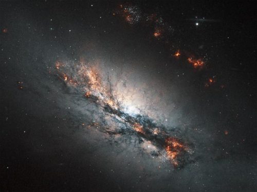 thenewenlightenmentage: Galaxy Gets Bent Image courtesy ESA/NASA A galaxy slightly smaller than our 