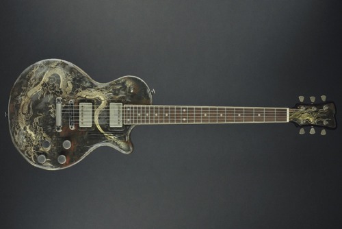 glorifiedguitars:  James Trussart Rust On Cream Dragon Engraved SteelDeville