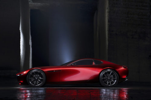 Mazda unveils the RX-VISION Rotary Sports Car Concept at the 2015 Tokyo Motor Show. Here’s the official skinny on this one:
“RX-VISION represents a vision of the future that Mazda hopes to one day make into reality; a front-engine, rear-wheel drive...