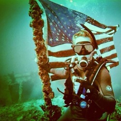 southernraisedmarinecorpsmade:  The flag still flying on a sunken WWII ship. TFM.