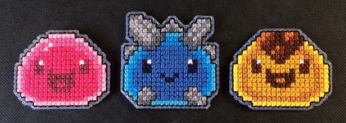 Been wanting to cross stitch some Slime Rancher critters, so I made a bunch of pixel slimes to work 