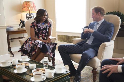 First lady Michelle Obama meets with Prince Harry over tea during European tour.Obama and Prince Har