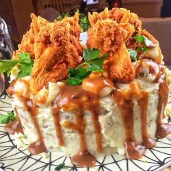   Collard green and cornbread cake. That’s mashed potato frosting. With gravy. And fried chicken sprinkles. by @DariusCooks   