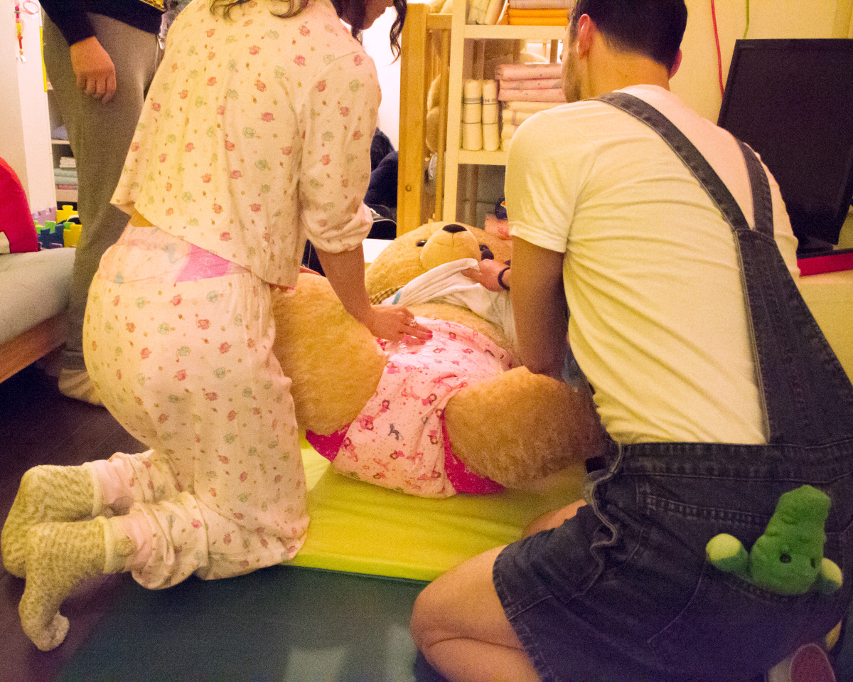 Me and my friend @montuur are putting Mr Cuddles in a pink diaper and a romper. Mr