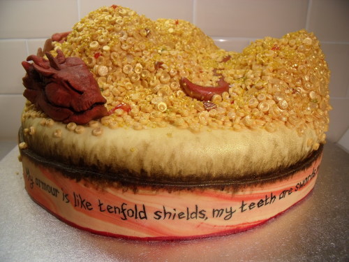 cupcakesandqwaffles:  My Smaug/Hobbit cake, titled ‘The Decoration of Smaug’ I finally finished the Smaug cake! After weeks of work, this is the finished product! I’m delighted with how it turned out, I’m glad I made the choice to hand-make all