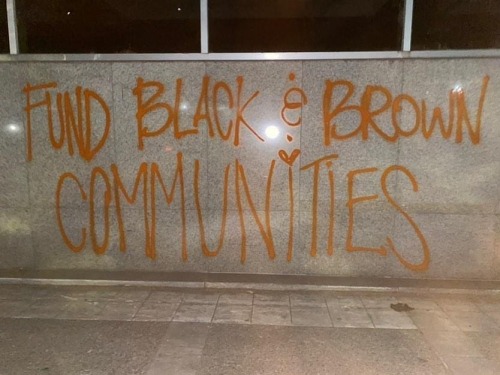 Graffiti on the Police Department building in downtown Sacramento following a protest on July 25, 20