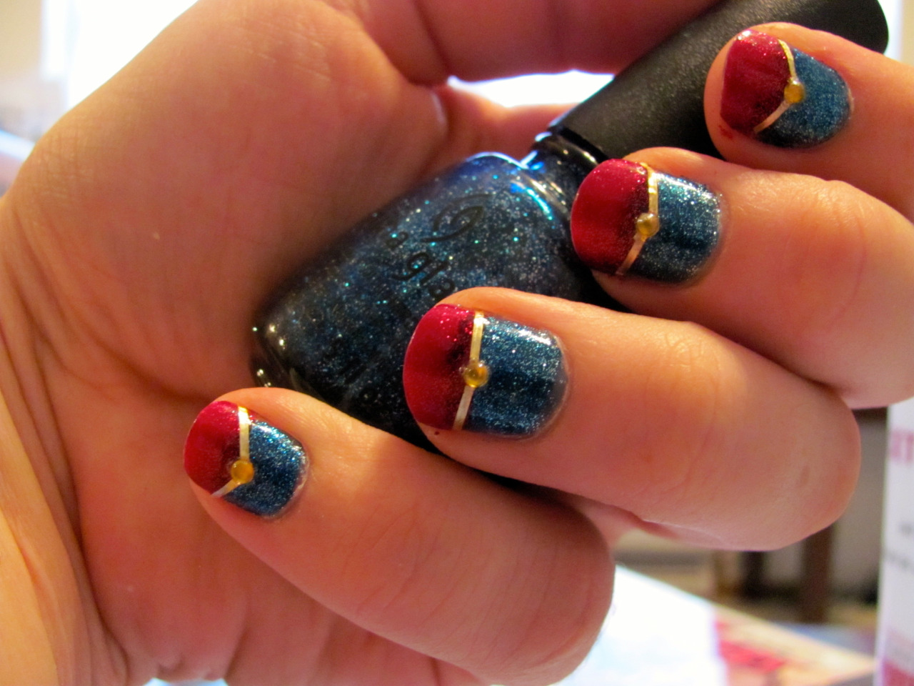 shinykari:  Captain Marvel manicure! Waaaay more complicated than most of my other