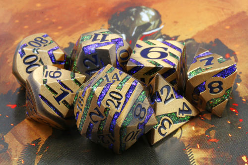 The newest Planar Infusion dice: Antique Gold with alternating layers of blue and green prismatic gl