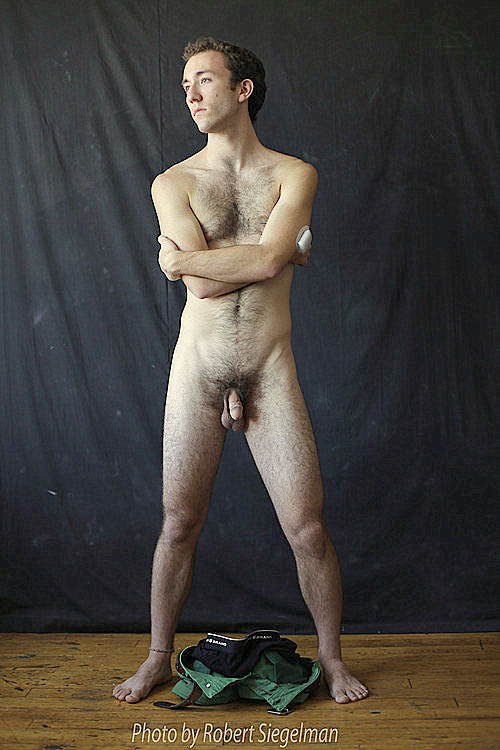 Defiant-looking little hairy fucker! Love his meaty legs, thick bush, and nice hangers.