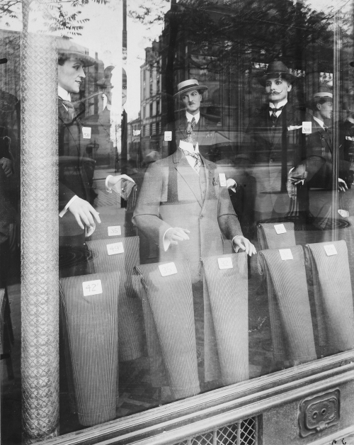 onlyoldphotography:  Eugène Atget: Avenue des Gobelins, 1925  The apparent subject of this picture is the art of commercial display in Paris in 1925. But the reflection in the window muddles the issue, for it obscures the clothing and seems to animate
