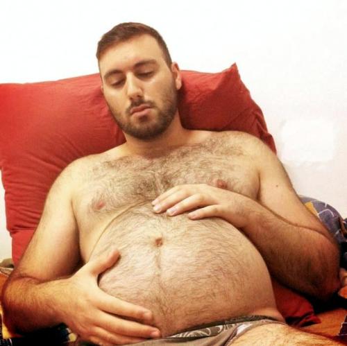 bigbellyinyourface:  Wowza I love the way his hands look wrapped around his round fat belly