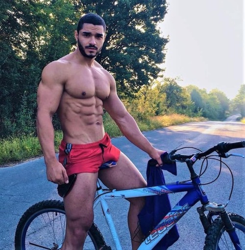 shorts-and-underwear:men-in-shorts:feticheleather:Can I sit on his cross bar ?Hummm