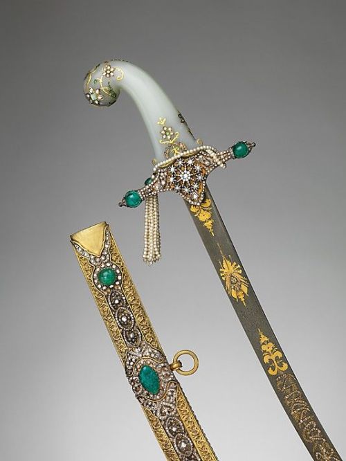 Saber with Scabbard Date: 19th centuryCulture: TurkishMedium: Steel, gold, gilt brass, diamonds, eme