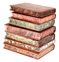 michaelmoonsbookshop:  old books 19th century leather bound books with marbled page edges 