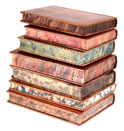 michaelmoonsbookshop:old books19th century leather bound books with marbled page edges
