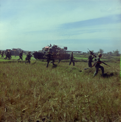 todaysdocument:U.S. Soldiers from the 3rd Brigade, 1st Infantry Division move across a clearing sear