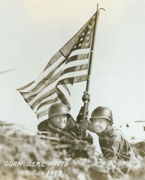 warhistoryonline:First flag on Guam, 1944. Photo: USMC. http://wrhstol.com/2k3eUWj