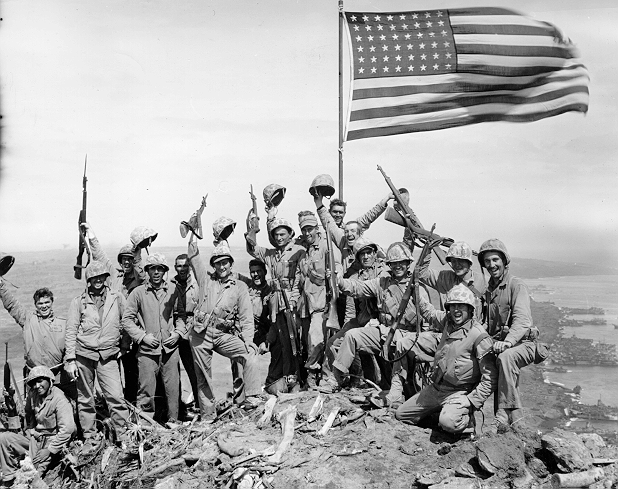 demons:  US Marines after raising the second flag on Mount Suribachi, 23 Feb 1945