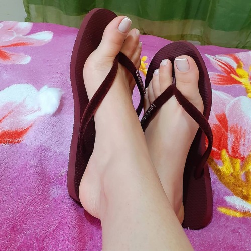 Pretty flip flops on pretty feet.