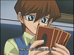 yugiohchildhood:  perfectionshipping:  Thanks for the trashy cards, Mokuba…   Look at that face cuuuute