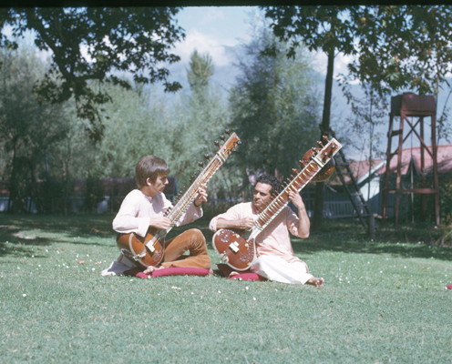 nmom:George Harrison playing sitar with Ravi ShankarCredit: Courtesy of the Harrison family