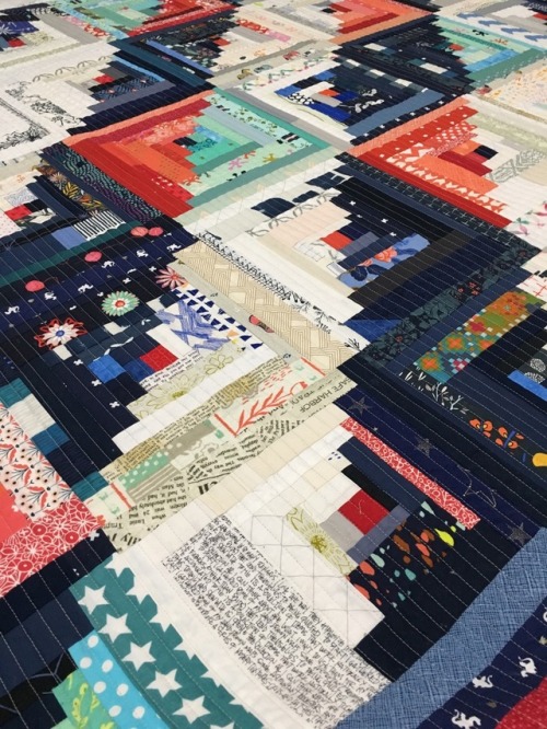 Log cabin quilting: This week, I finished quilting my log cabin scrap quilt. I decided on straight l