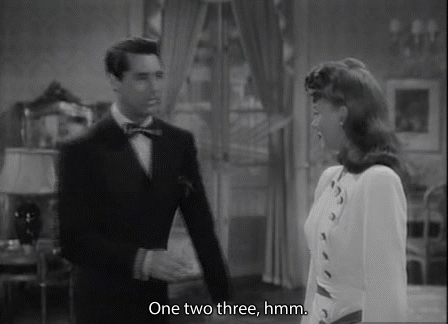 theidentitymad: Cary Grant mimes a strip tease for Ginger Rogers in Once Upon a Honeymoon (1942) 