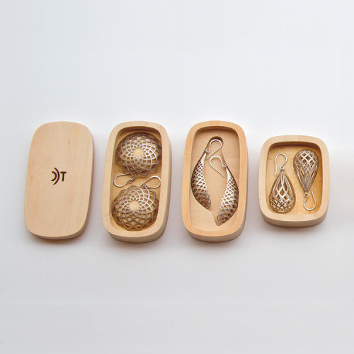 chicagoif: vazelodian: Koura Earrings by David Trubridge Beautiful product, beautiful packaging!