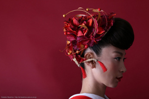 Fiery headpiece by Atelier Beatrice, shown here complementing a vivid and very classical bridal outf