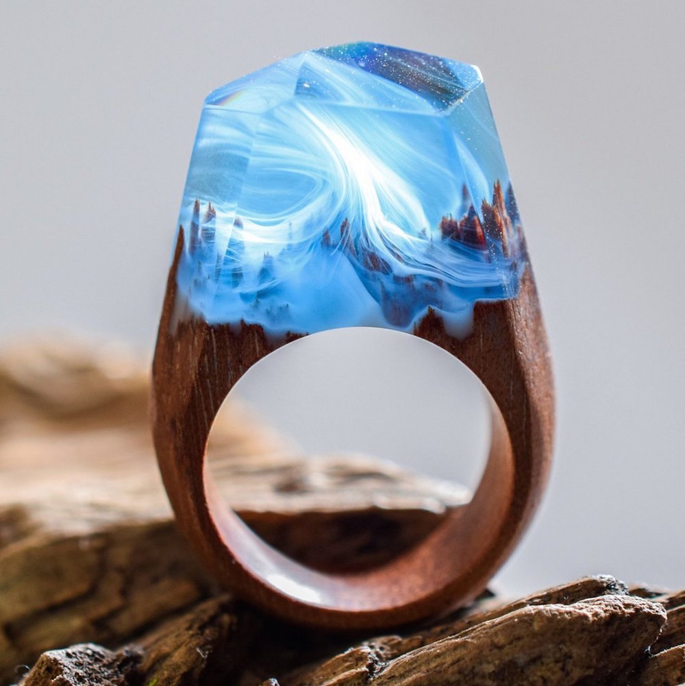 itscolossal:  New Ethereal Worlds Encapsulated In Wood and Resin Rings