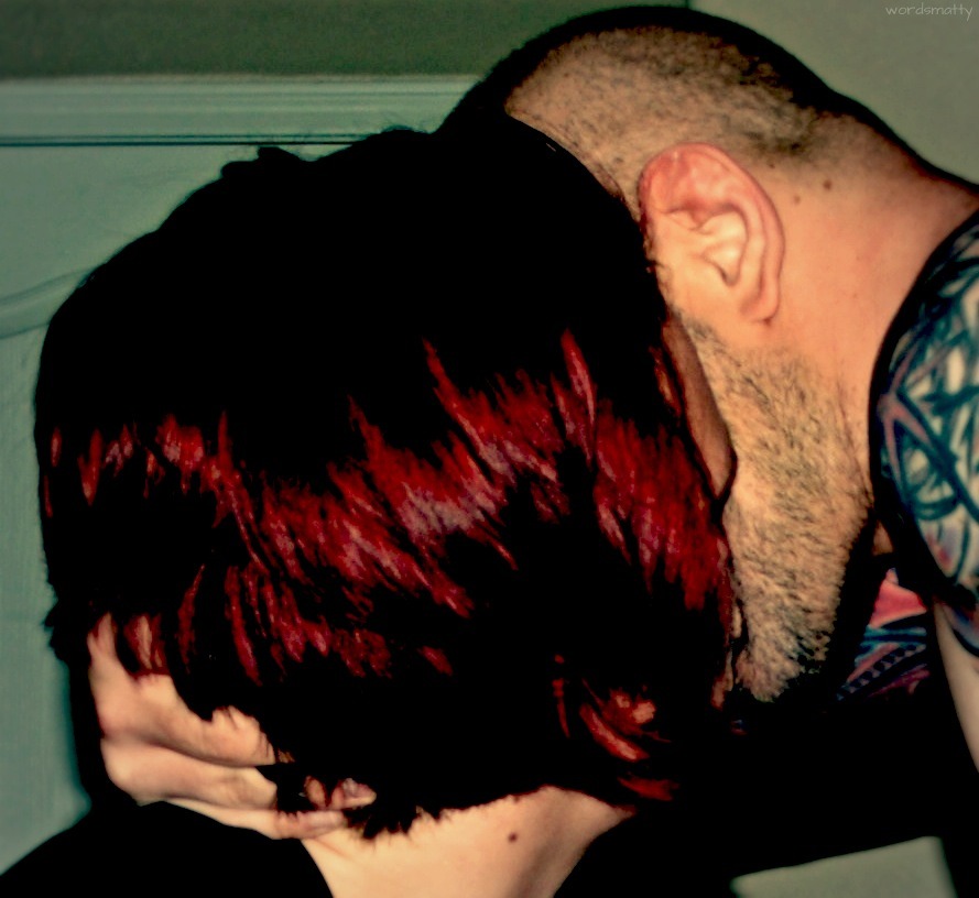 It is difficult to capture a real kiss without showing too much face, but I think