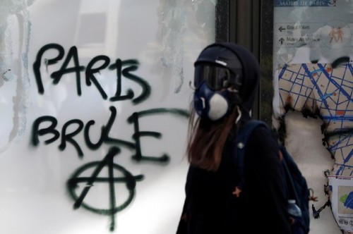 “Paris Burns”Seen during a gilets jaunes protest in Paris on March 16, 2019