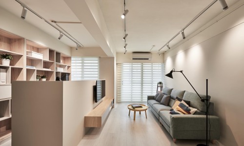 A Partition In The Living Room Creates Space For A Home Office In This Apartment