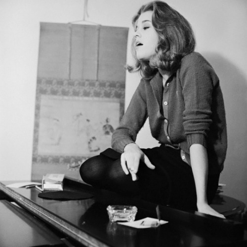 carmelasoprano: Jane Fonda smoking on top of a piano from Good Housekeeping magazine.