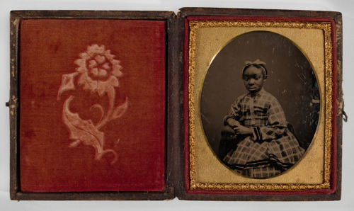 Tintype of a girl in a plaid dress, 1870s, Smithsonian: National Museum of African American History 