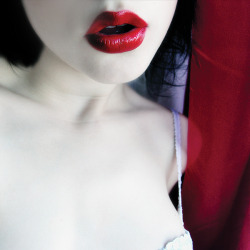 seekingasanctuary:He has a thing for red lips and pale skin.