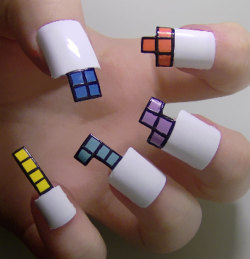 lulz-time:  Have you ever seen nail art this CRAZY? take a peek to find out right here! These are just scary!  