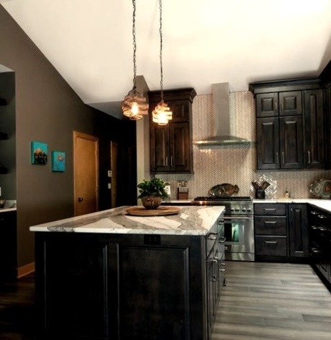 Kitchen - Eclectic KitchenMid-sized Eclectic U-shaped Vaulted Ceiling Enclosed Kitchen Idea Featuring