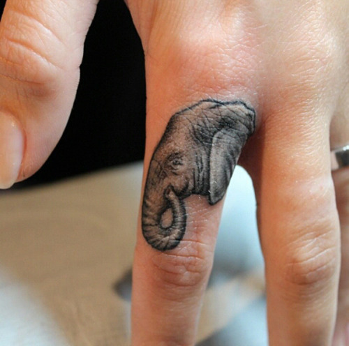 Cute small finger tattoos