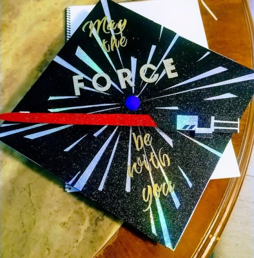 i forgot to post these, but i graduated college last month! me and my roommate decorated our caps to