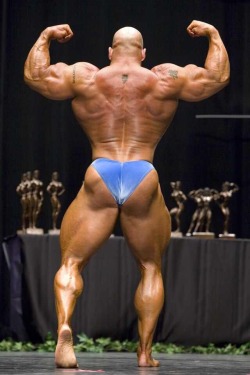 Outstanding rear double bicep matching his
