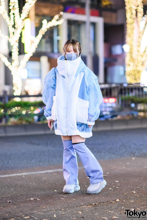 Japanese graphic designer Nene on the street in Harajuku wearing an oversized jacket by Japanese fas