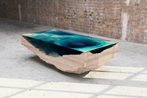 culturenlifestyle:  Stunning Table Displays the Ocean AbyssDesigned by the London based furniture design company Duffy London, the Abyss Table beautifully resembles the ocean’s depth and liquid texture with the aid of wood and sea-foam colored glass.