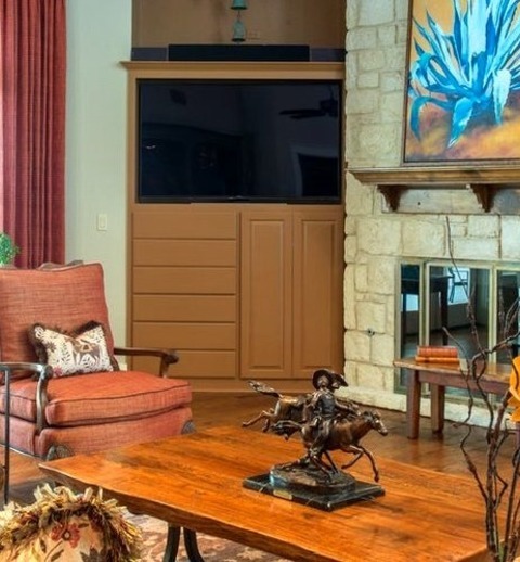 Family Room Open In AustinInspiration For A Huge Southwestern Open Concept Medium Tone Wood Floor Family