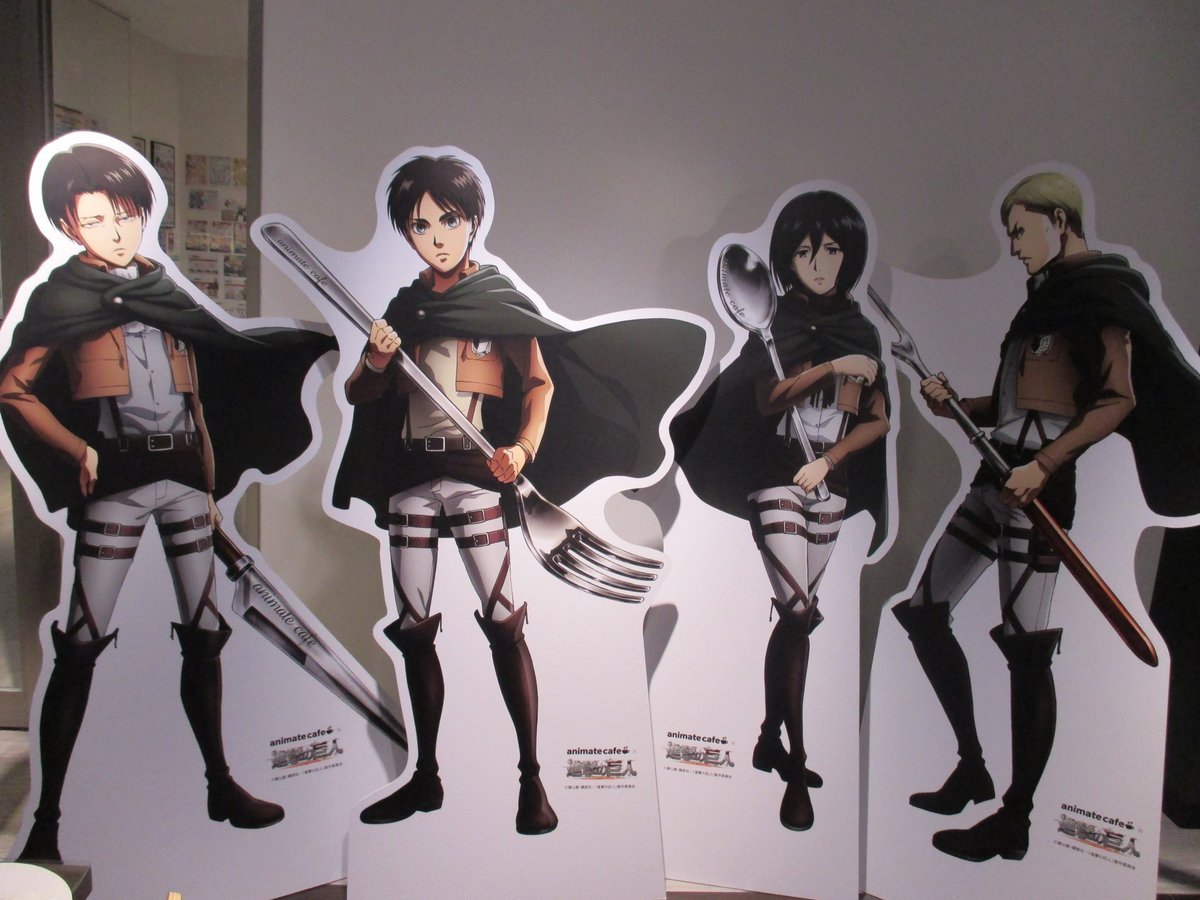 In-store cardboard stands of Levi, Eren, Mikasa, and Erwin with their utensils at