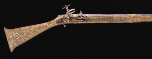 peashooter85:Ornate brass mounted miquelet rifle originating from either Tunisia or Algeria, early 1