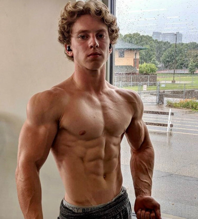 gay-transformation:Can’t believe this hot guy is coming over any minute to take my virginity away. His wavy curly hair and not to mention his muscles, he has almost no fat on his frame besides on his thick long dick. “Doorbell rings”Hi! Hey! You