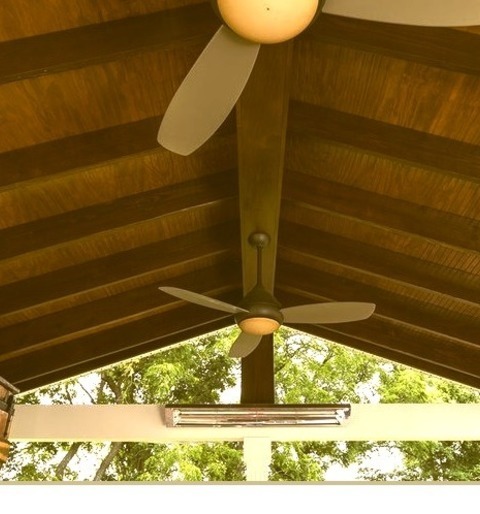 Deck - CoveredExample Of A Large Classic Backyard Deck Design With A Roof Extension And A Fire Pit