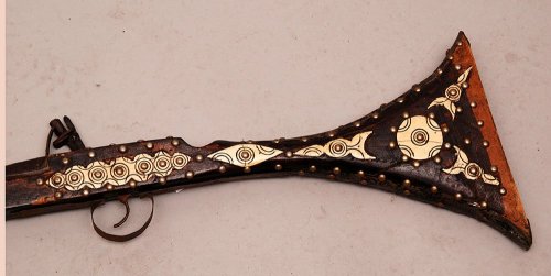 Ornate bone and tack mounted snaphuance musket originating from Morocco, 19th century.