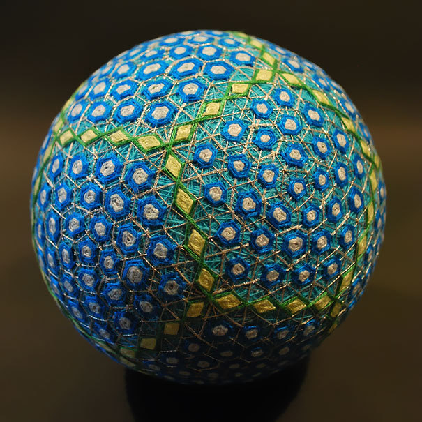 asylum-art:  A Huge Collection of Embroidered silk  Spheres by  92-year-old grandmother